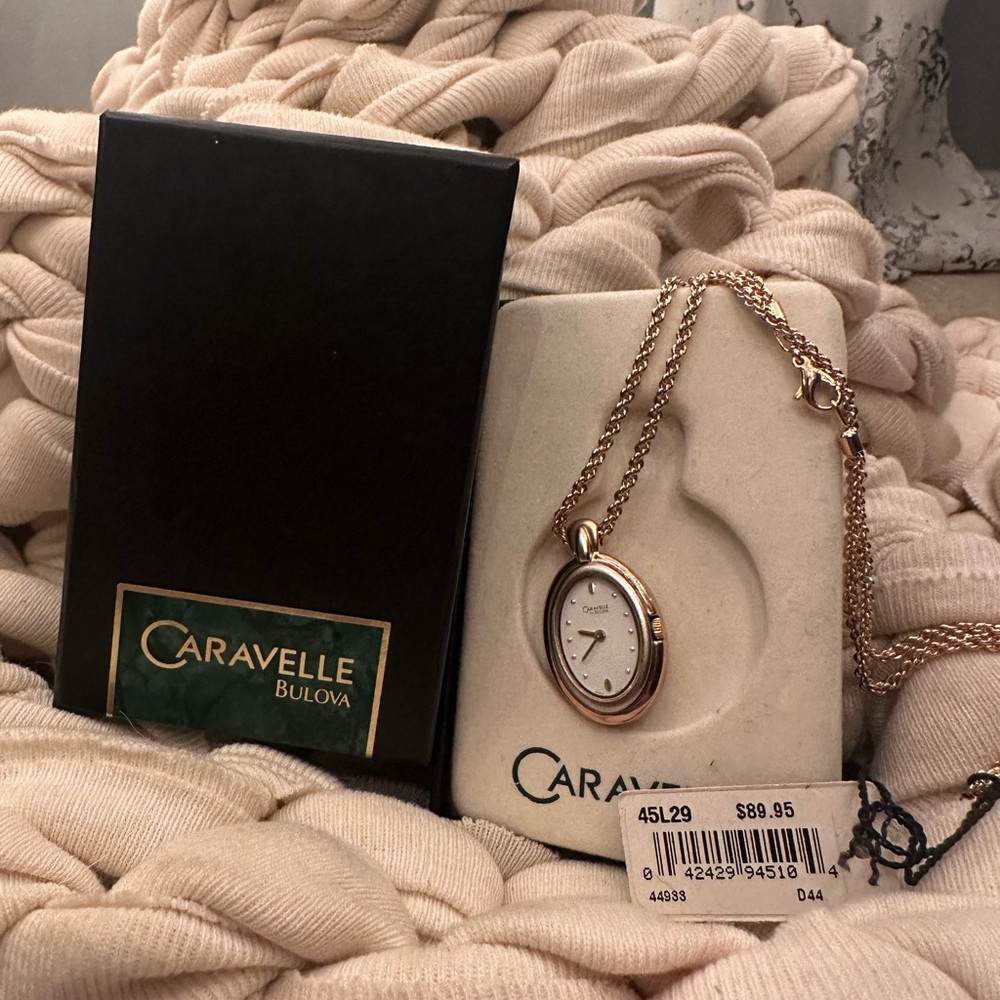 CARAVELLE By Bulova Oval Flower Design Silver Dial Pendant Watch Necklace *11